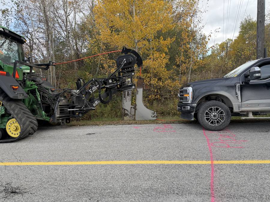 Apex Fibre plow unit installing conduit along a rural Ontario road